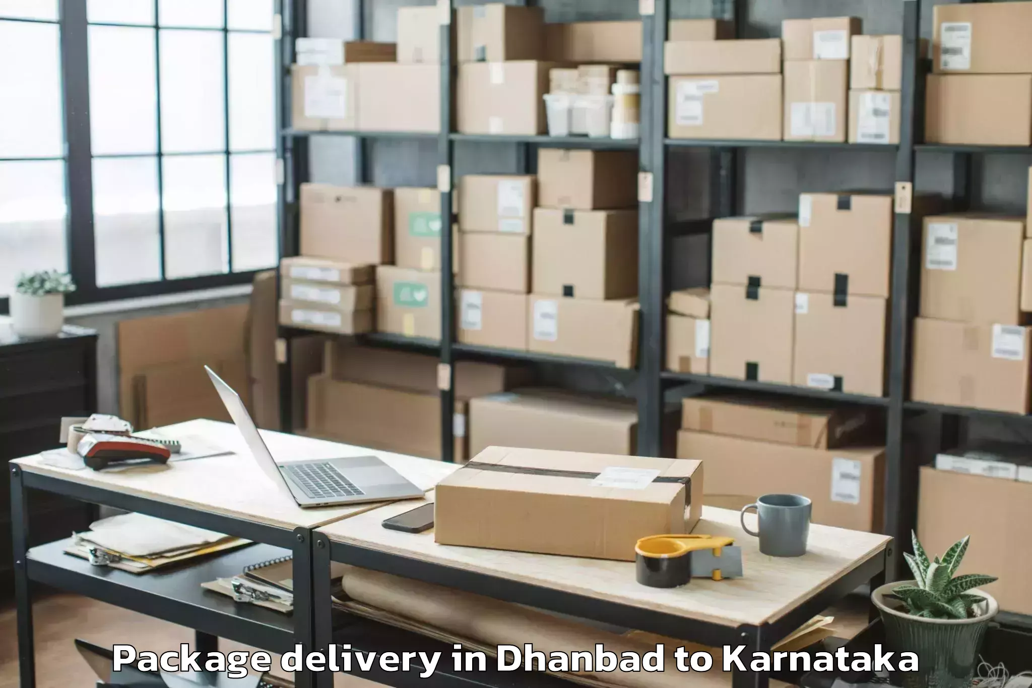 Trusted Dhanbad to Reva University Bangalore Package Delivery